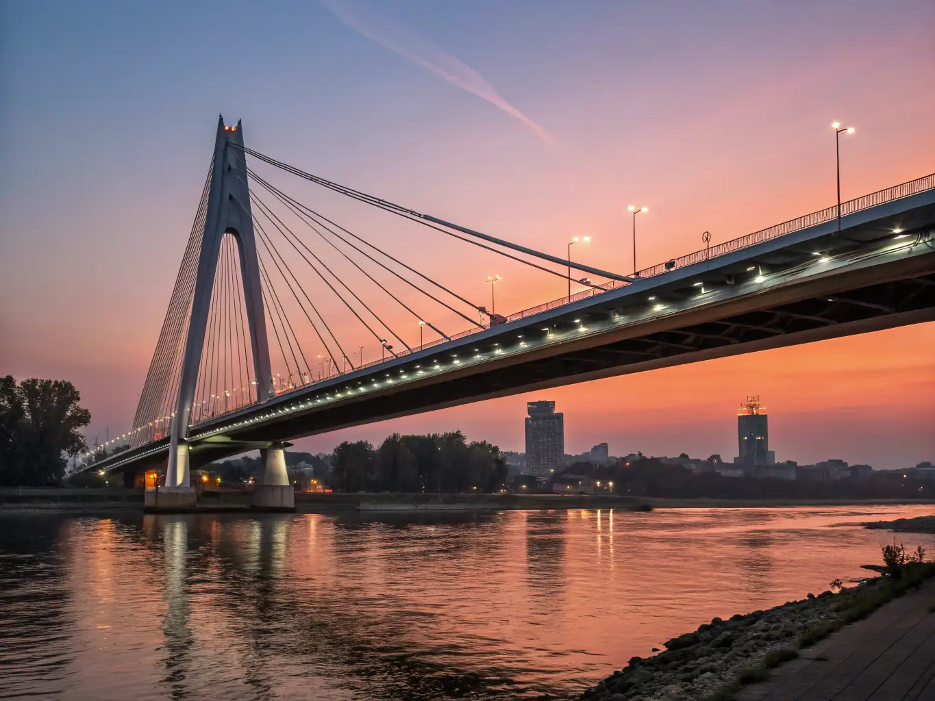 London's Tower Bridge at night, reflecting the city's vibrant and historic atmosphere.